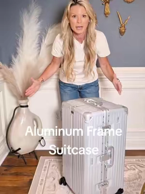 This @PHIVILLA Home aluminum frame suitcase is such high quality! It is available and all sizes and has a built-in battery charger along with TSA approved locks! It rolls like a dream and is so easy on vacation! #tiktokshopcreatorpicks #phivilla #aluminumsuitcase #travel 