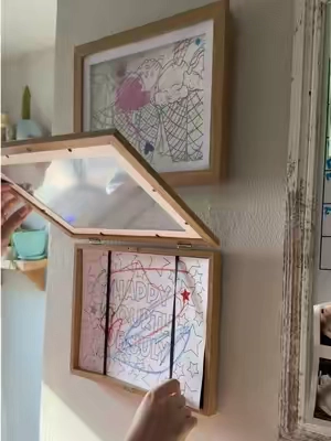 Always display your kiddos art🥹 These magnetic frames make it so easy and can hold soooo much art! #kidsartframe #momhack #toddlerart #kidsart 