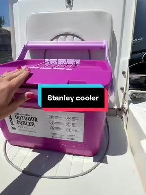 Stanley cooler that keeps your drinks ice cold and is hot pink. Of course this one is for the girls. #stanley #stanleycooler #cooler #boatday #summeressentials 