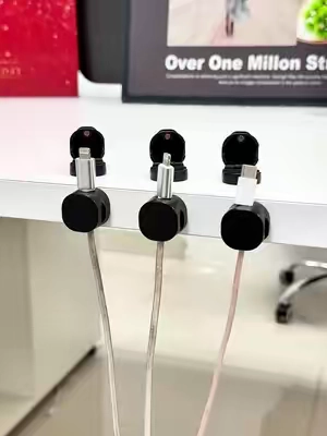 No more digging under your desk for charging cables 🔌 This magnetic cord organizer keeps your cables right where you need them — neat, accessible, and clutter-free. Perfect for your desk, nightstand, or car. #SummerVibes #tiktokshopsummersale #cablemanagement #tiktokfinds #TikTokMadeMeBuyIt 