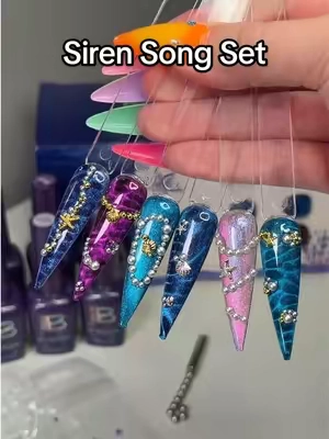 Obsessed with these ocean inspired cat eye nails. 🌊✨ Siren Song is 28% off right now, making each full-size gel polish less than $5! @BeetlesGelPolish #nailinspo #oceannails #cateyenailart #nailkit #diynailsathome 