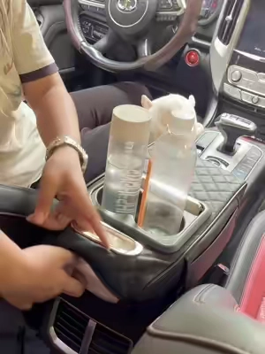 Trending 4-in-1 Car Armrest Box! All-in-one tissue holder, cup holders, storage bin, and phone slot – keep your car neat and organized! 60Y #TikTokTrending #CarAccessories #smartdriving