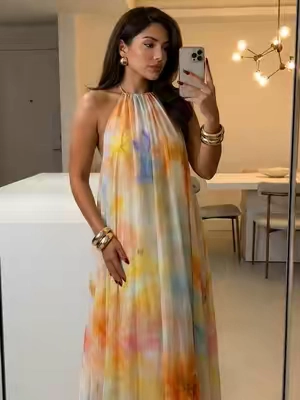 Tie-dye has never looked this sophisticated. An artistic print that turns every street into a runway.#OOTD #summerwins #eveningdress #dressshopping #summeroutfits 