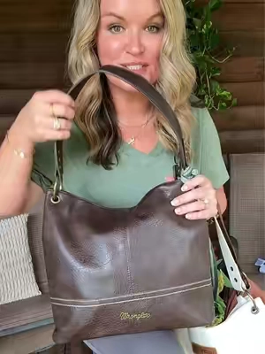 My fav 🤎 wrangler bag @Rustic Charm Bootic #tiktokshopcreatorpicks #wrangler #shoulderbag #hobobag 