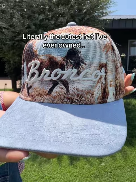 The cutest western trucker hat 🤠💙 This American Needle Bronco snapback is the perfect accessory for country concerts, lake days, rodeos, and everyday outfits! #snapbackhat #TruckerHat #westernstyle #tillys #westernfashion @Tillys 