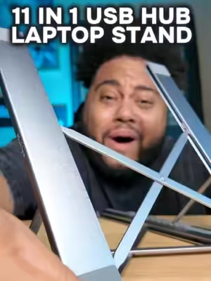 This isn't just a laptop stand. It's also an 8-port USB-C docking station with 4K HDMI, USB ports, SD/TF card readers, and fast USB-C charging. Perfect if you're tired of carrying a bunch of adapters. Plus, it folds flat for travel. Check the orange cart to see what offers are available today. - #LaptopSetup #DeskSetup #TechTok #WorkFromHome #MackMotivates 