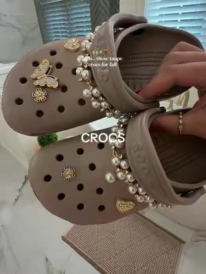 The taupe Crocs are baacckkk!  They are the neutral pair that always work with every casual fall outfit 🤎 Easy to slip on, comfortable enough for everyday wear, and the perfect shade to pair with leggings, denim, sweats, or cozy socks. #crocs #crocssandals #fall #fallfashioninspo #tiktokshopsummersale @Crocs 
