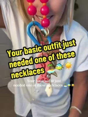 colorful beach necklaces, dopamine jewelry, fish necklace, beach charm necklace, layered necklaces, summer jewelry, vacation jewelry, teacher outfits I swear these instantly make every outfit look more fun. Whether you’re wearing a white tee, a swimsuit, or a simple dress, these colorful beach-inspired necklaces are the easiest way to add a little personality without overthinking it. I always get asked where they’re from! #DopamineDressing #BeachJewelry #ColorfulJewelry #SummerStyle 