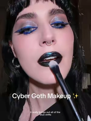 The cyber goth glow your makeup was missing. ⚡💙 💎 #SpaceAgeHighlighter in Sky Walker   Your multi-use blue multichrome essential for face, eyes, and lips. Layer it, swipe it, and glow from every angle.  #bluemakeup #altmakeup #funkymakeup #bluegothmakeup 