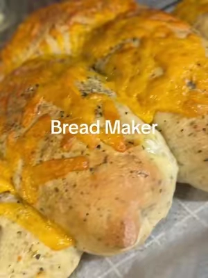 🧄🧀 Italian Herb & Cheese Sub Rolls  (makes 6 sub rolls) Subway-style rolls: soft, savory, cheesy — made right in your kitchen 🍞 Note: Bread Maker does the dough — then you shape, top, and bake in the oven. Add ingredients to the bread pan in the order listed: Warm water (110°F)	1 cup	240 g Olive oil 	2 tbsp	28 g Sugar	1 ½ tbsp	20 g Salt	1 ¼ tsp	7 g Bread flour	3 cups	360 g Instant yeast	2 tsp	6 g Dried Italian herbs (oregano, basil, thyme mix)	1 ½ tsp	2–3 g Garlic powder	1 tsp	2.5 g Bread Maker Settings 	•	Setting: Menu 11 - Raw Dough (23 min) 	•	Once the cycle has completed do not open the top.  Allow dough to rise in  the bread maker for 45-60 minutes. 🧑‍🍳 Shaping, Topping & Baking 	1.	Turn dough onto lightly floured surface. Divide into 6 equal pieces. 	2.	Roll each piece into a sub/hoagie shape (about 6 inches long). 	3.	Place on parchment-lined baking sheet. Cover and let rise 30–45 mins. 🧀 Topping: Right before baking: 	•	Brush tops with egg wash (1 egg + 1 tbsp water) 	•	Sprinkle with a mix of: 	•	Shredded mozzarella or Monterey Jack 	•	Extra Italian herbs 	•	Optional: pinch of Parmesan 🔥 Bake: 	•	Bake at 375°F (190°C) for 15–20 minutes 	•	Rolls should be golden and cheese bubbling #homemadebread #madefromscratch #breadmaker #subrolls 