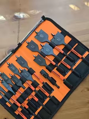 Jorgensen 14-piece spade drill bit set with quick-load connector and sizes from one quarter inch to one and a half inches. Built for fast, clean drilling in wood with durable carbon steel bits, self-feeding tips, and efficient chip removal. #woodworking #toolreview #drillbits #garagetools #brocas 
