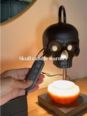 This skull candle warmer is perfect for Halloween 🖤 #skullcandlewarmer #skullcandlewarmerlamp #candlewarmer #halloweendecor #skulldecor 