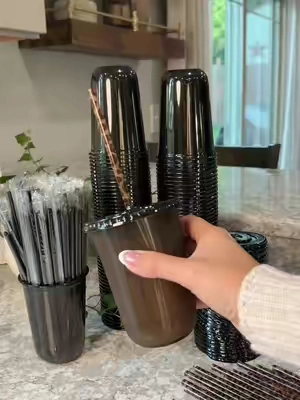 Coffee just tastes better in a cute cup. ☕️🤎 These disposable iced coffee cups come with black straws, but I paired mine with leopard straws for the aesthetic and I’m obsessed! #CoffeeTok #HomeCafe #TikTokShopFinds #KitchenFinds #AestheticHome