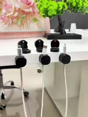 No more digging under your desk for charging cables 🔌 This magnetic cord organizer keeps your cables right where you need them — neat, accessible, and clutter-free. Perfect for your desk, nightstand, or car. #SummerVibes #desksetup #cablemanagement #tiktokfinds #TikTokMadeMeBuyIt 