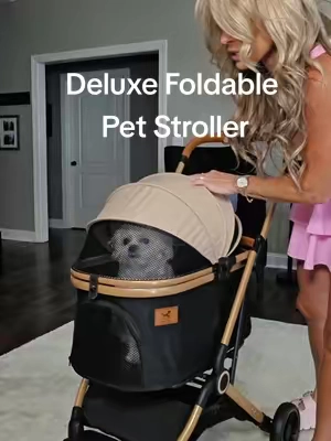 This @PAWPUBBY PET Deluxe Foldable Pet Stroller is such great quality and so lightweight! It folds up so small , Wheels like a dream and has a cup holder and storage! #petstroller #tiktokshopcreatorpicks #dogstroller #pawpubby 