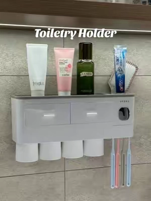Wall-mounted toothbrush holder with toothpaste dispenser – clean & quick! ✨ #bathroomhack #organization #tiktokfinds #cleaninghacks #toiletry 