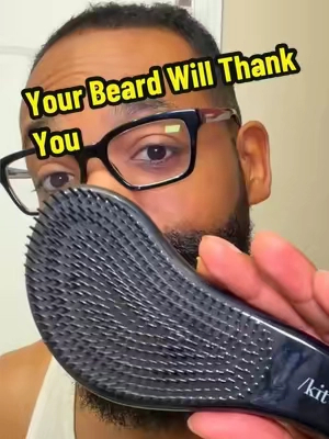 Not every brush is beard-friendly. This one helps work through knots with flexible bristles and pairs well with your beard oil to keep your beard looking neat without all the tugging. #beardcare #beardgrooming #mensgrooming #groomingessentials