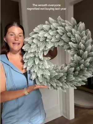 My daughter just said “we’re gonna have the prettiest wreath in the neighborhood” 🥹🎄✨ #christmaswreaths #wreaths #porchdecor #christmasdecor  
