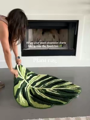 This rug was MADE for the plant girlies 🪴#lumi #rug #plantrug #monsterra #bathmat 