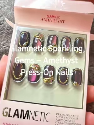 The Amethyst design combines a rich purple velvet finish with raised gold foil and 3D pearl details for a jewelry-inspired manicure in minutes. #Glamnetic #PressOnNails #AmethystNails #PurpleNails #NailTok @Glamnetic 