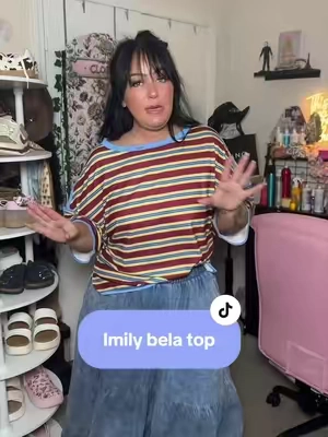 The kind of tee that makes getting dressed easy. 💚 Stripes never go out of style, and the oversized fit is perfect for front tucking, knotting, or wearing loose. Cute, comfortable, and made for everyday wear. @Imily Bela Apparel #TikTokShopSummerSale #stripedshirt #oversizedfashion #everydaystyle #casualoutfit 