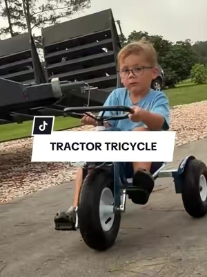 He’s just as obsessed as I am 🚜💙 #tricycle #outdoortoys #toddlermom #outdooractivies #kidstoys 