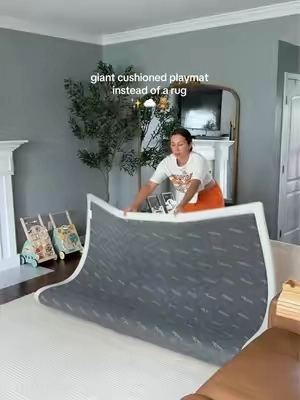 We swapped our living room rug for a play mat… and it’s been one of the best parenting upgrades we’ve made. 🤍 Our big kids use it as a tumbling mat, the baby learned to crawl on it, and I never have to stress about hard falls during playtime. More family time, less worrying, and a space that actually works for this season of life. #montessorimom #toddler #MomHack #BabyPlayMat #tiktokshopsummersale 
