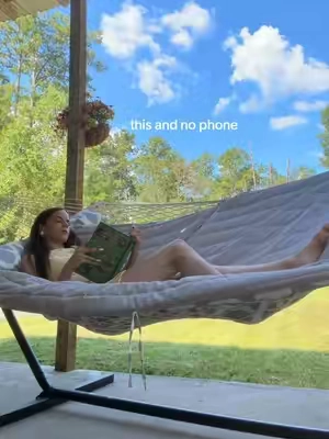 this two person heavy duty hammock comes with metal stand and is on sale! #patioseason #tiktokshopcreatorpicks  #hammock