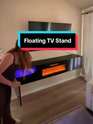 This might be the coolest thing I’ve gotten on TikTok🔥 #floatingtvstand #electricfireplace #fireplacetvstand #tiktokshophomefinds #homeupgrades  @amerlifeofficial home makeover furniture, affordable tv console with electric fireplace and storage, home aesthetic glow up