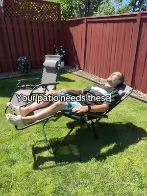 ☀️ The kind of patio chairs that make you want to stay outside a little longer ☀️ These reclining patio chairs give you a comfortable place to kick back with your feet up. The adjustable reclining design, padded headrest, and attached side tray make them perfect for relaxing on the patio, by the pool, or in the backyard. #patiocchairs #recliningchairs #outdoorchairs #patiofurniture #backyardideas reclining patio chairs zero gravity chairs outdoor lounge chairs patio recliner backyard chairs poolside chairs comfortable outdoor chairs