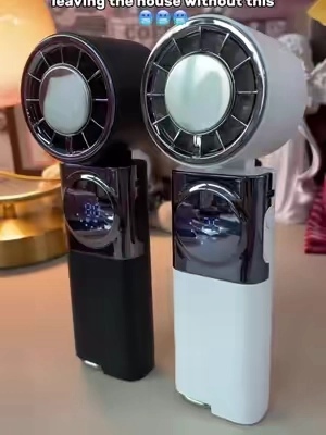 ❄️🥶Oh my God... this is my favorite summer gadget! It's not just a fan-it has an ice-cooling plate and doubles as a power bank. Stay cool and keep your phone charged wherever you go. Grab yours while it's on sale! #PortableFan #CoolingFan #SummerMustHave #PowerBank