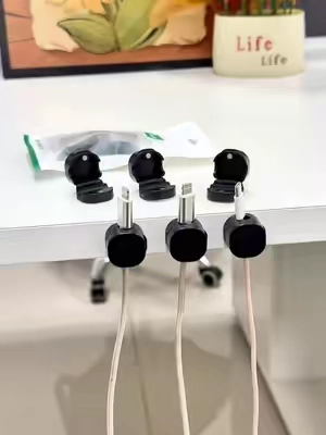 No more digging under your desk for charging cables 🔌 This magnetic cord organizer keeps your cables right where you need them — neat, accessible, and clutter-free. Perfect for your desk, nightstand, or car. #SummerVibes #desksetup #cablemanagement #tiktokfinds #TikTokMadeMeBuyIt 