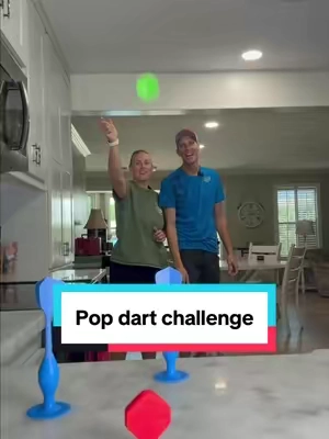Yeah, she’s pretty good! This is pop darts, play on the counter, window refrigerator or anywhere with a clean surface! #popdarts #popdartsgame #familygamenight 