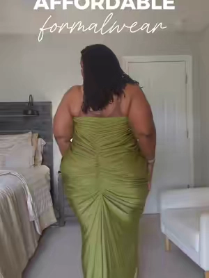 Formalwear does not have to cost a fortune to look expensive. 💚 The rich olive color, fitted silhouette, and all-over ruching give this plus-size maxi dress such an elevated look. It already brings enough drama on its own, so you can add simple heels and jewelry and let the dress do the rest. This would be beautiful for a wedding guest look, gala, formal dinner, birthday celebration, or any event where you want to look luxurious without blowing the budget. Would you wear this color to your next special event? Tap the 🛒 to shop #formalwear #formaldress #plussize #straplessdress #weddingguestdress 