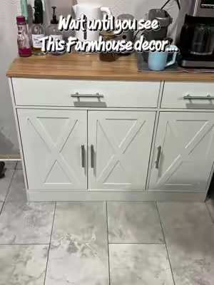 Turn unused wall space into beautiful, functional storage with the Walsunny Farmhouse Sideboard Buffet Cabinet. Featuring three cabinet doors, two roomy drawers, and adjustable shelves, it keeps everything from dinnerware to coffee essentials neatly tucked away. The classic white finish and rustic barn-door design blend perfectly with farmhouse, modern, or cottage-style homes. Ideal as a buffet, coffee bar, entryway cabinet, or extra kitchen storage. #farmhousestyle #farmhousedecor #coffeebar #tiktokshopsummersale #tiktokshopcreatorpicks 