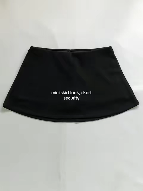 Mini skirt look, built-in shorts underneath. This black skort is cute, comfy, and way easier to wear out. #skort #blackskort #miniskirtoutfit #skirtwithshorts #goingoutoutfit