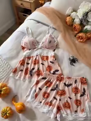 This Halloween pumpkin pajama set is too cute! Perfect for cozy nights and relaxing spooky seasonal moments at home. #halloween #pajamaset #halloweenpajama #halloweenstyle #spookyseason  