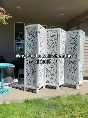 This is such an easy way to create privacy without making permanent changes 🤍🌿 This six-panel folding room divider helps separate open spaces, cover clutter, create a private corner or add a decorative backdrop anywhere in your home. The lightweight folding design makes it easy to reposition, and it folds down when you need it out of the way. folding room divider six panel privacy screen wood room divider indoor privacy screen portable room partition decorative folding screen room separation ideas