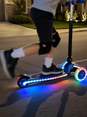 👀🛴✨ The light-up wheels are even cooler at night! Smooth, stable, foldable—and way too fun to ride. 🌈 #LightUpScooter #ScooterTok #OutdoorFun #LEDWheels #TikTokMadeMeBuyIt #GiftIdeas #FunFinds #RideInStyle