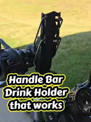 POV: Your bottle keeps sliding or bouncing out on the road until this self-adjusting handlebar drink holder locks it down tight 🏍️ This Adjustable Motorcycle Handlebar Drink Holder grips different bottle sizes securely, rotates for easy reach, and mounts solid on most handlebars. Built for real rides so your drink stays put through bumps and turns. Simple, strong, and convenient every time you ride. If you want reliable hands-free access to your water or energy drink, this holder is a must. Drop a 🏍️ if you need this! Tap the orange cart 🛒 #MotorcycleAccessories #DrinkHolder #HandlebarMount #BikeAccessories #MotorcycleGear 
