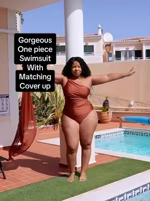 Such a pretty, one piece asymmetric top swimsuit with matching cover up skirt  #onepieceswimsuitwithmatchingcoverup #2pieceswimsuit #swimsuit #onepieceswimsuit #swimwear