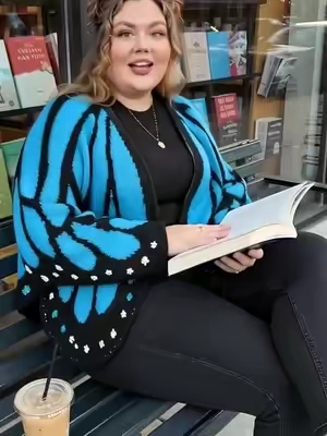 I love an all-black base outfit, but this butterfly cardigan brings the perfect pop of color and keeps me so warm! 🦋💙  #plussizefashion #curvystyle #FallFashion #midsizefashion #plussizeootd