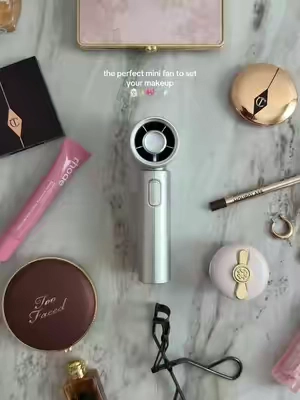 fits perfect in my makeup bag🎀🪽 . . . #makeup #minifan #portablefan #grwm #chic mini portable travel size fan purse makeup chic girly aesthetic 