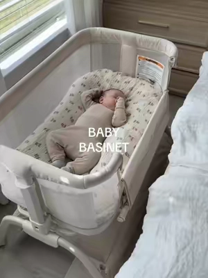 Breathable mesh sides, adjustable height, a waterproof mattress, and storage underneath for all the baby essentials. Everything you need for those newborn nights. 🤍 #babyessentials #newbornmusthaves #babybassinet #newmom #tiktokshopfinds