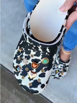 Cow print Crocs 🐮 #crocs #clogs #country #backtoschool #crocsnewarrivals 