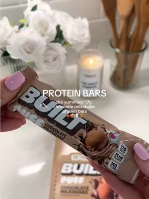 how they made protein bars this yummy I’ll never know 🥹🍫🤌 @Built Bar #protein #proteinbar #proteinbars #proteinsnacks #chocolate 