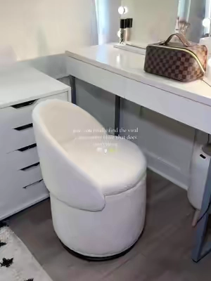 Completely obsessed with this viral 3-in-1 sherpa vanity chair 🤍 ✨ 360° swivel ✨ Hidden storage for all my beauty essentials ✨ The softest, coziest sherpa finish It makes my whole vanity setup look and feel so much more luxe.  #makeuproom #vanitysetup #neutralaesthetic #vanityorganization    