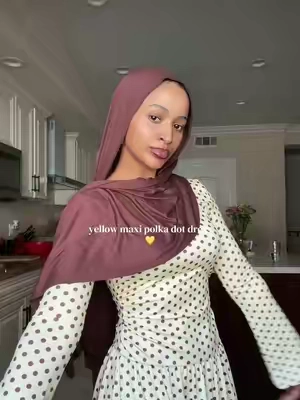 don’t usually wear yellow but she’s the exception 😍💛 #polkadotdress #hijabitiktok #hijabifashion #maxidress 