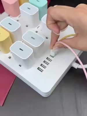 A supercharged 26-in-1 power strip with 20 outlets, 4 USB ports, and 2 Type-C ports.#TikTokShop #Charger #PowerStrip #PhoneAccessories #TechGadgets 
