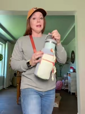 The best part? You don’t have to carry a purse. 💧🎒 This Thread water bottle sling keeps your water bottle, phone, keys, cards, and cash all in one place, so you can stay completely hands-free. Perfect for theme parks, the zoo, concerts, sporting events, travel, hikes, or just running errands. Once you use one, you’ll wonder how you ever carried a water bottle without it. 🙌 #HandsFree #TravelMustHave #ThemeParkEssentials #ConcertEssentials